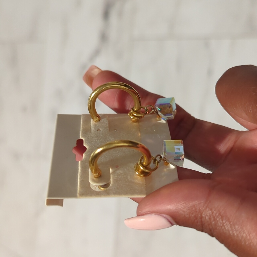 Gold hoops with a charm